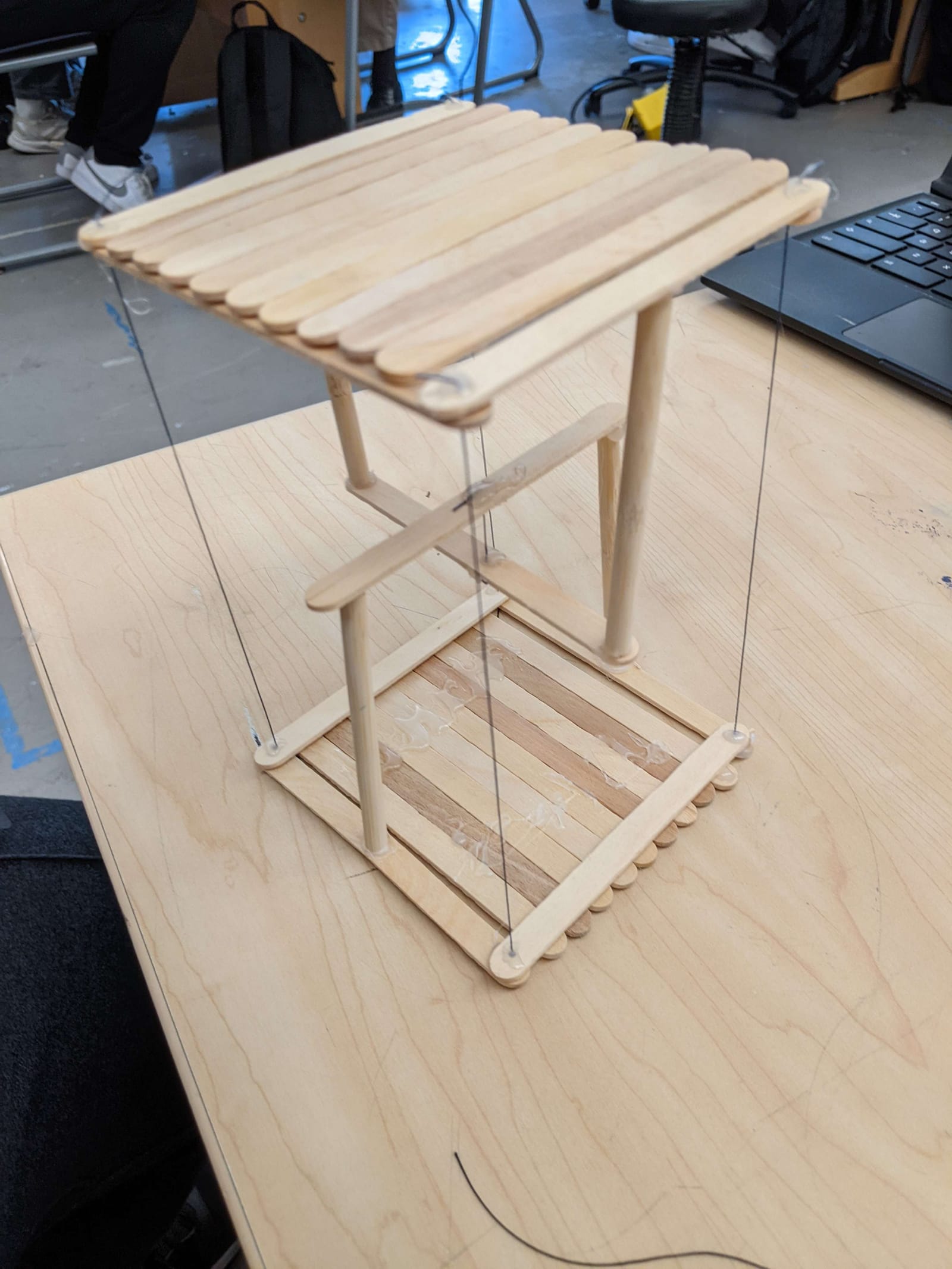 Tensegrity table hand-built from popsicle sticks